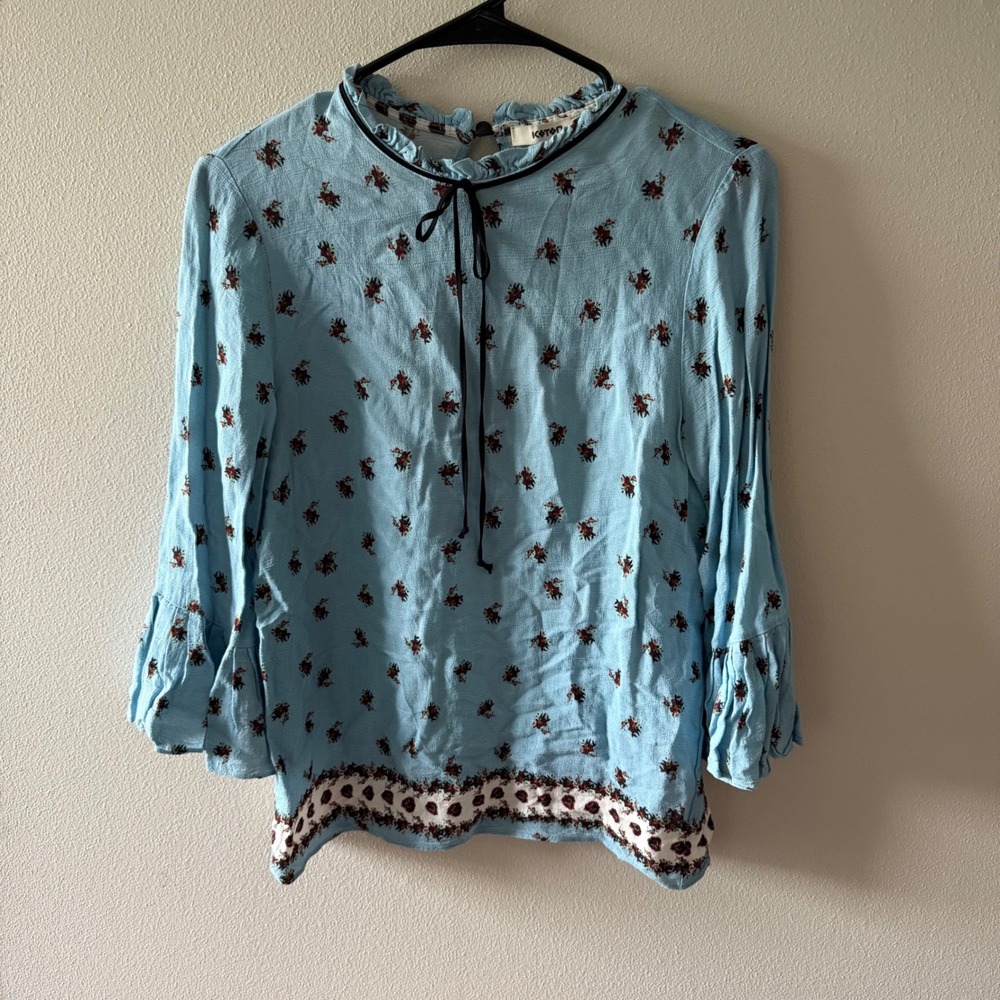 Blue Koton floral print long sleeve top with ruffled neckline and tie detail